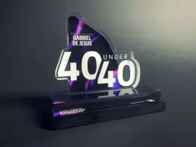 A "40 Under 40" award for Gabriel De Jesus, showcasing how strong is acrylic. The award features a sleek, modern design with vibrant purple and pink accents.