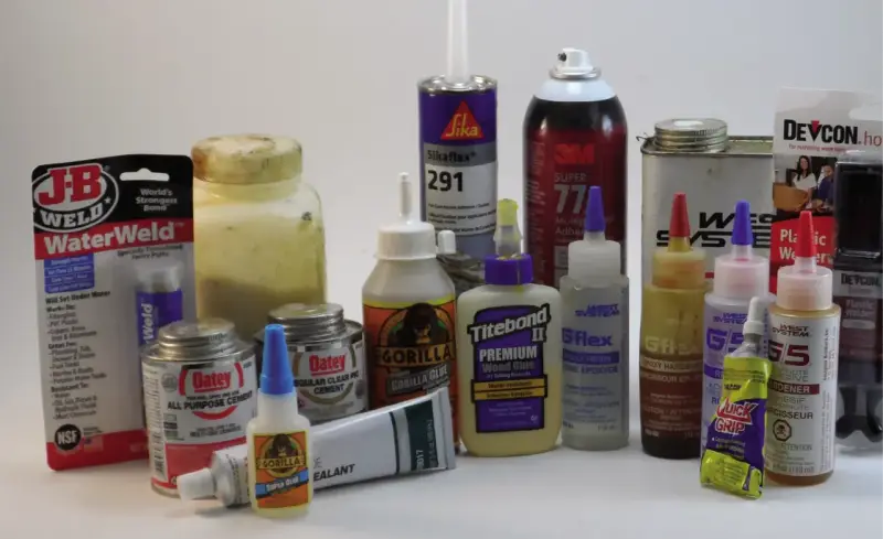 A collection of adhesives, including Gorilla Glue, JB Weld, and various Loctite products, ready for any repair job.